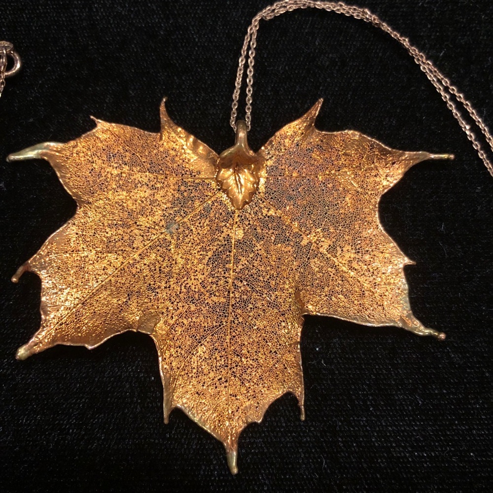 Maple leaf dipped in copper.